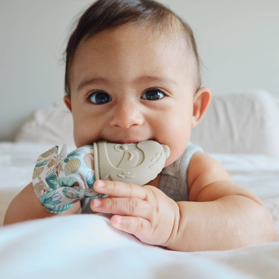 Sloth Itzy Mitt™ Silicone Teething Mitts - Premium Baby Soothers from Itzy Ritzy - Just $8.99! Shop now at Pat's Monograms