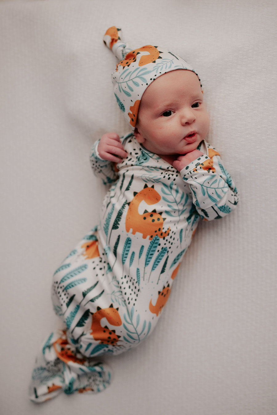 Dinosaur Knotted Baby Gown and Knot Cap - Premium Just for baby from Three Little Tots - Just $24.95! Shop now at Pat's Monograms